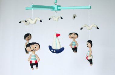 I want to object to this. I want to make a joke about weird mustachioed men floating over your infant's head. But they're so damned cute! By FunkySheepy