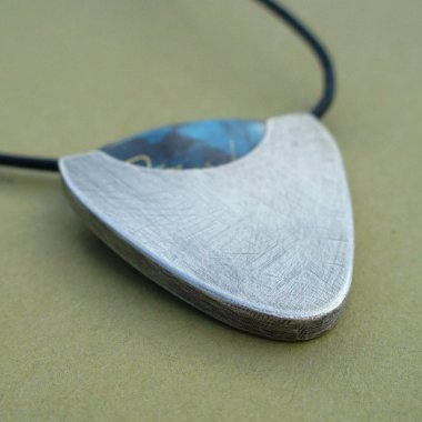 Genius guitar pick holder necklace by LunasaDesign