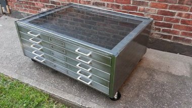 Ingenious reclaimed flat-files coffee table. If we didn't already have a beautiful coffee table, this beauty would be on its way to us. By ArtSpaceIndustrial