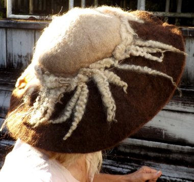 I looked at this one for a long time, and I'm pretty sure those are real hairballs. By cat lover HomeOnTheRangeToo