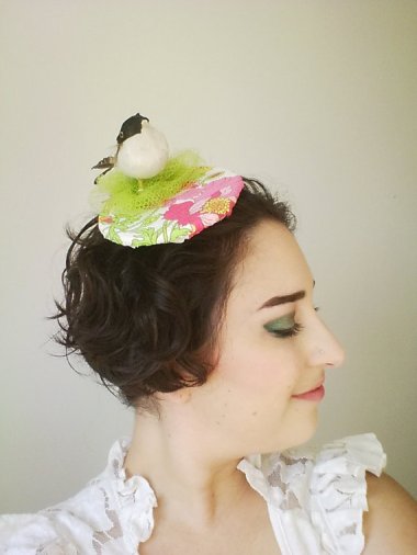 If PrancingPeacockHats really wanted to make this bird and nest hat realistic, she should have included some rubber bird droppings down the back.