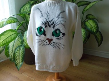 Say no to cat sweaters. By OmasBestKnits, which store is well stocked in the feline knitwear category