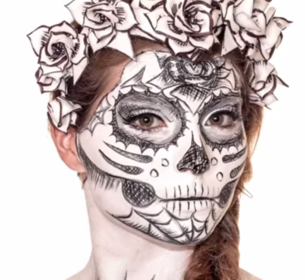 Cross-hatched Calavera sugar skull makeup for Mexican Day of the Dead