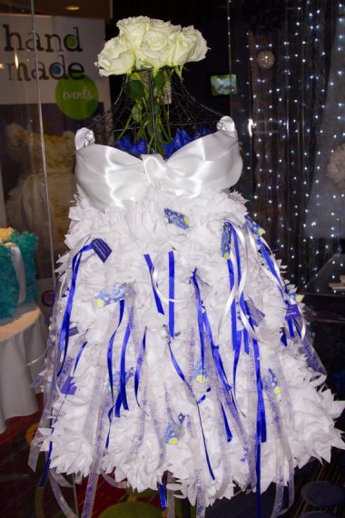 And speaking of recycling opportunities, get a load of this $1200 "PuffScape 4ft WEDDING Place Card Centerpiece" by EventsHandmade. Yike.