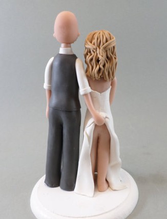 On the other hand, this topper is the wrong kind of memorable. By MudCards, embarrassing brides' mothers since 2010!