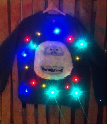 Horrendous/awesome Christmas sweater by TipitDesigns