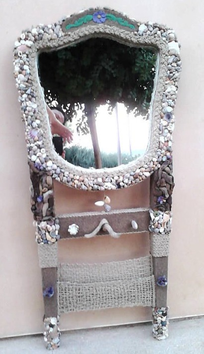 A mere $6,279.04 will put this upcycled entry mirror near your door. Presumably to scare away visitors. By ISeaThings