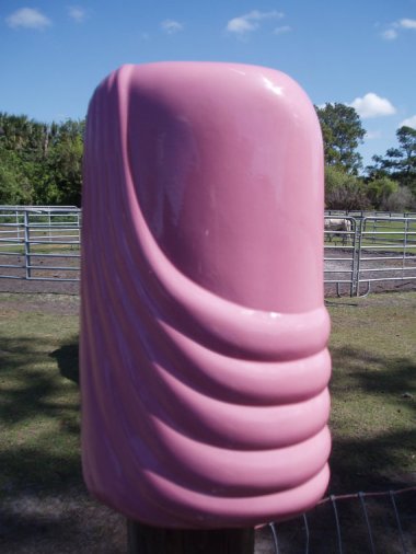 Planning on giving roses but need a vase that makes a statement? How about this "Vintage Pink Valentine's Vase" sold by TheMixMatchedMutt? I keep thinking it's reminding me of something . . .