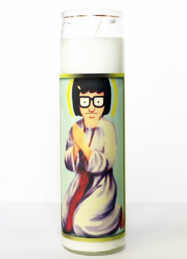 Having trouble finding love? Why not try this "Saint Tina Belcher Prayer Candle" to help you "Pray for your heart to poop its pants." Sold by HolyPopCulture