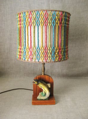 I went looking for the ugliest vintage lamp on Etsy, and when I saw this thing, I stopped looking. $85 "Rustic" fish lamp sold by WilShepherd