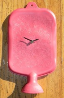 Look. A clock made out of an actual douche bag. The description includes this sentence, "Or give it to that one person you know." By IMOTime