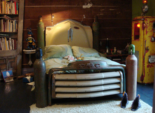 This bed made from a vintage truck is spectacular. Look at those lines!