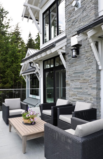 Grey and white outdoor seating area design by Eyco Building Group