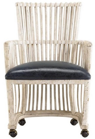 This Carribean-flavored chair is a refreshing departure from some of the heavier black & white options I found. Sold by Houzz