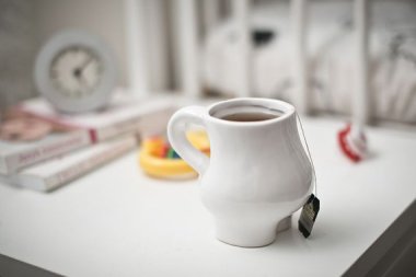 It's kind of cute, but it still bums me out. Why would you want a special maternity coffee cup when you can't have caffeine? By WoodStockIn