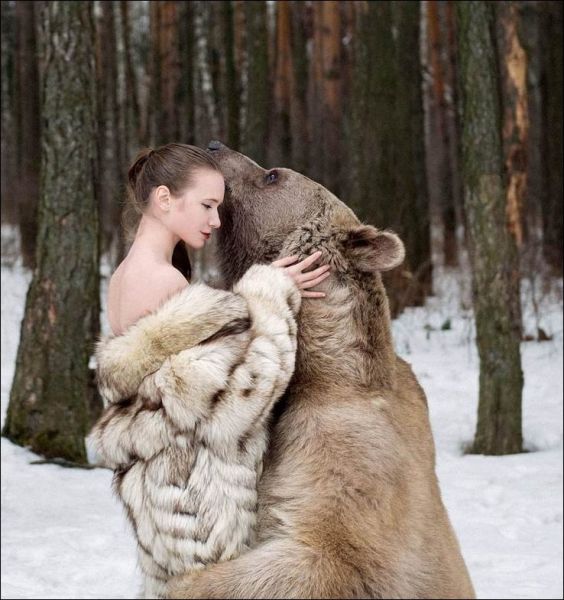 giant brown bear and model by Olga Barantseva