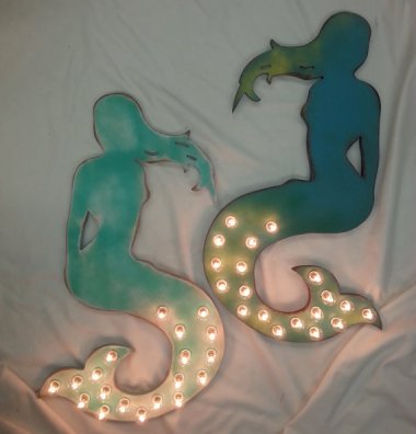 And now for something I love. These mermaid marquee-style wall art pieces are perfect! Definitely going on my next Christmas list. By AmericanVintageInc