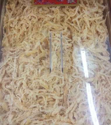 Squid jerky. I'm not going to lie. If it were in front of me, I'd probably try it. But it still sounds like a terrible idea. By NewaShop