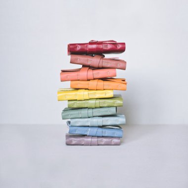 Rainbow-hued mini leather journals by JackdawBindery