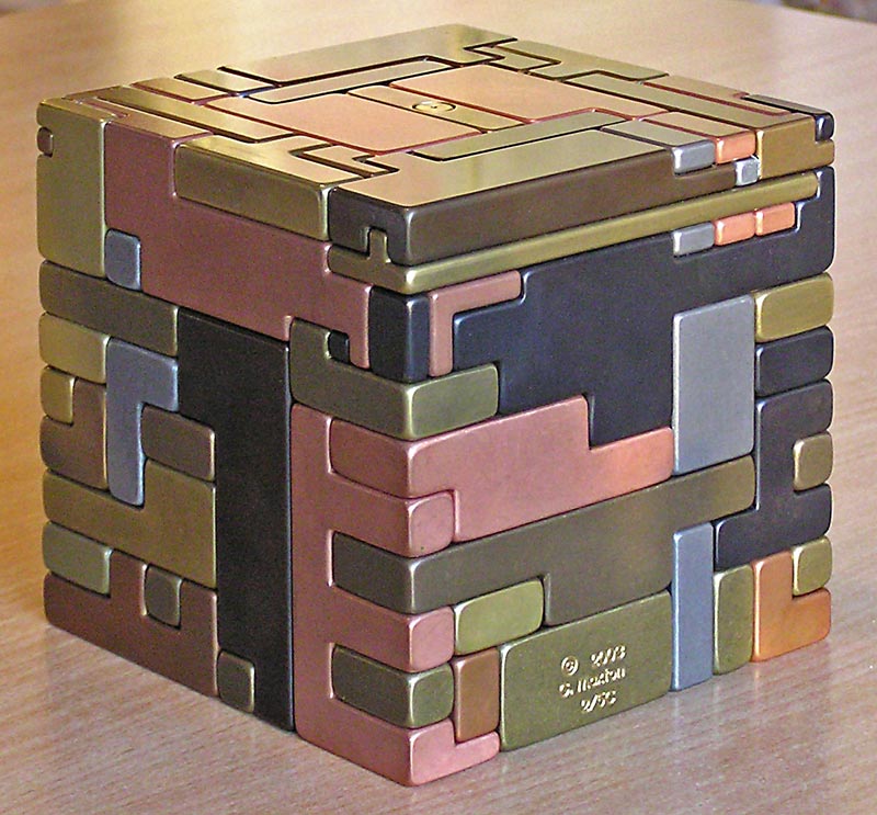 Labyrinth (42-piece, 30 lb. Japanese puzzle box requiring the correct sequence to open.) ©GarE Maxton