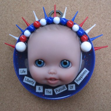 Okay, I know this isn't technically a doll, but part of it used to be! By GJarvisJewelryEtc