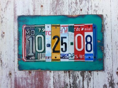 Let's start with something awesome. I would love to have this piece of art made from old license plates. By recycledartco