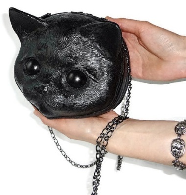 Oddly scary leather cat purse. By FamilySkiners