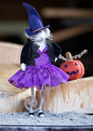 While I am not a collector of gewgaws and dolls and such, I do admire her attitude and her skinny legs. By Candyfleece