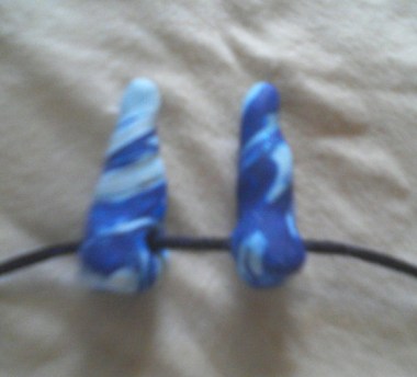 Very scary-looking teeth horns that will definitely stay in place and not flop around hilariously. By SerrannaNshannon