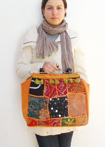 How big do you think the coins that she keeps in there are? By StarBags