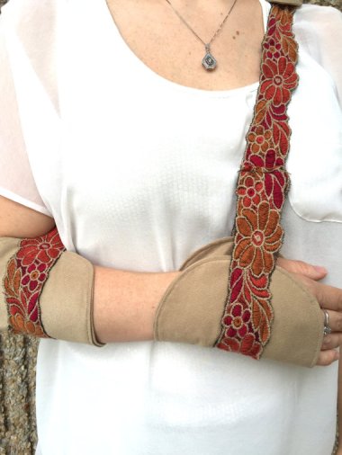 Just awful arm sling. By https://www.etsy.com/listing/247598148/joni-arm-sling