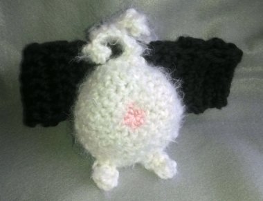 What is it, you ask? It's cat butt ear warmers, thank you for asking! By TheCrochetAnything