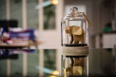 An elephant with its trunk raised is said to be good luck, so this origami under glass would be a perfect gift! By FlorigamiShop