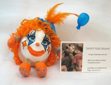 The best thing I can say about this "whimsical hostess gift" is that because it is mostly head, it should be a lot easier to fend off when it comes for you in the night. By TwentyFourCrowns