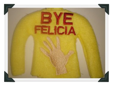 This is a sweater for one of those creepy shelf Elf things. My niece would love it. By NiniSaysSew