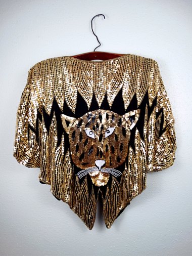 As bad as the current selections are, I couldn't resist including a few from my day, like this bit of sequined derpery. By Braxae