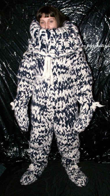 This is listed as a catsuit. Somebody needs to put that cat on a diet. By Strickolino (And I assume the garbage bag backdrop means kitty's not housebroken)