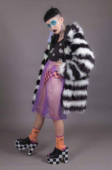 I am not so old that I can't appreciate what she's got going on here, but if it's winter coat weather, SHE MIGHT WANT TO PUT ON SOME PANTS. Just saying. By DevoWevo