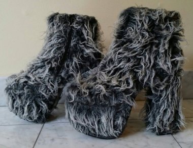 Because hookers get cold, too! (I'm a total hypocrite. I would wear these in a hot minute if they weren't covered with wet dog.) By AquaDystopia