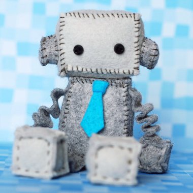 I would not have expected to find a plush robot cute, but there he is. By GinnyPenny