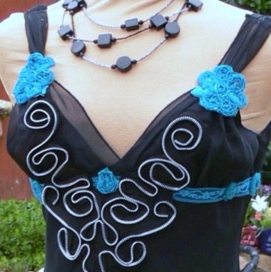 Now, why would you take a perfectly good dress and glue stupid shit to it? Why? By Classyorsassy