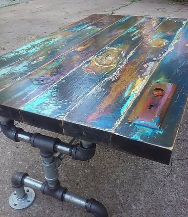 This is the coolest door-as-table I've ever seen. Love the patina! By trashstudio
