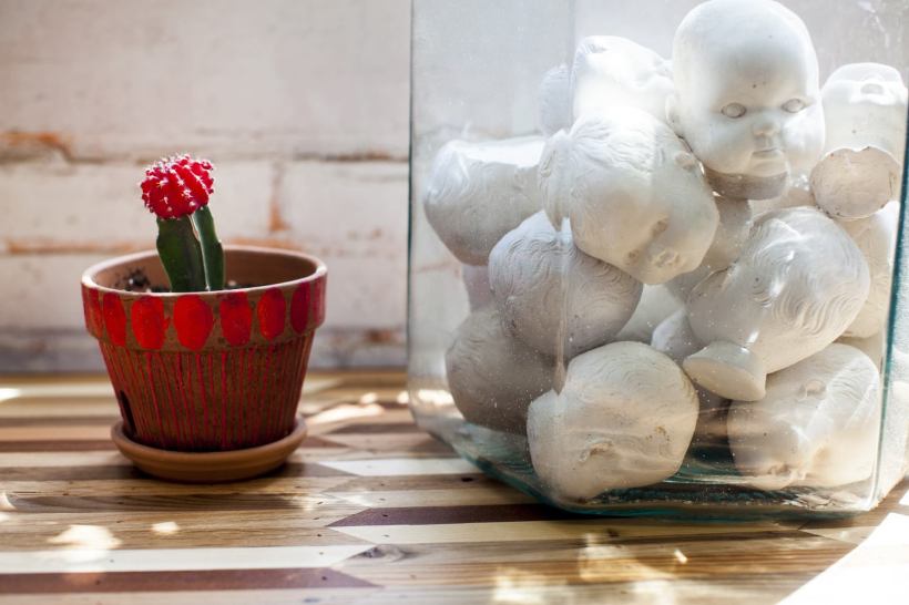 How much you want to bet she got that jar of doll heads on Etsy? madebywoodhand.com