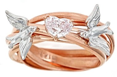 Of course, spending real money isn't any guarantee of good taste, either. $33K will get you this gewgaw that looks like you bought it at the Hallmark Store. By JenniferYiJewelry