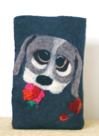 Nothing communicates sophisticated world traveler like pulling your passport out of a derpy puppy holder. By FELTBYNARELLE