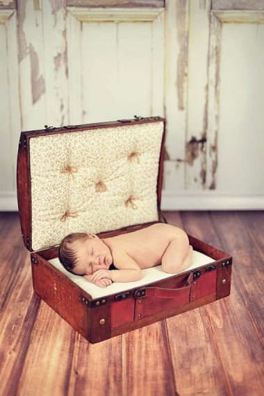 Don't be fooled. Babies may be travel-sized, but they're still a misery to travel with. Photo prop by CreaTiveDesiGns4