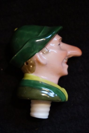 Jimmy Durante bottle stopper. Back in the day, I guess this is how you'd know you'd arrived. By UStamp2