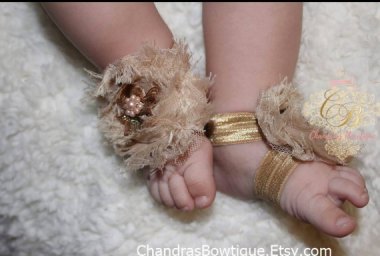 Think your baby is fully dressed? Well, did you remember to stick stupid shit to her feet? By Chandrasbowtique