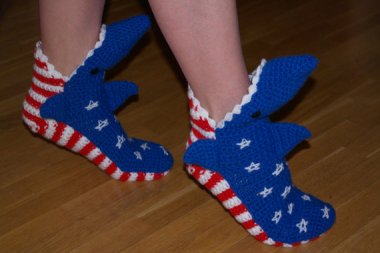Flag shark slippers. Why? Etsy. That's why.