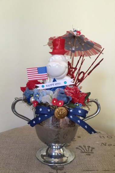 If there's one thing I think of when I think of patriotism, it's a hippo with a cocktail umbrella